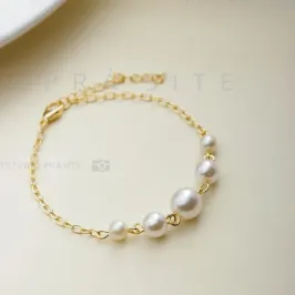 Pulseira perola quad.