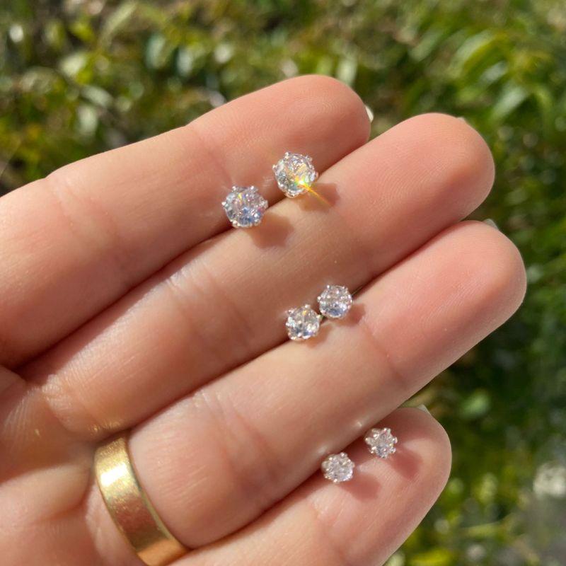 Brinco ponto de luz prata